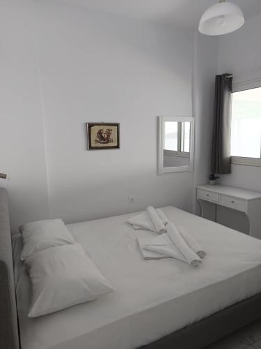 Postel nebo postele na pokoji v ubytování Kalymnos Platy Gialos Mousellis Makis Apartments