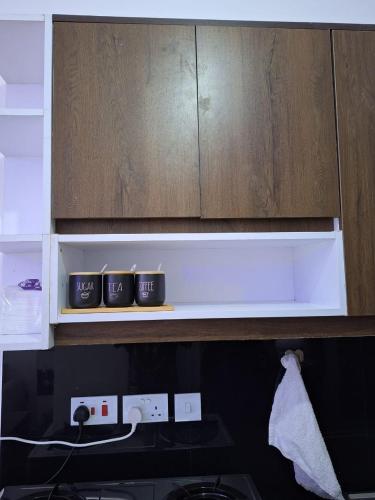 Kuchyň nebo kuchyňský kout v ubytování ADMG Spaces