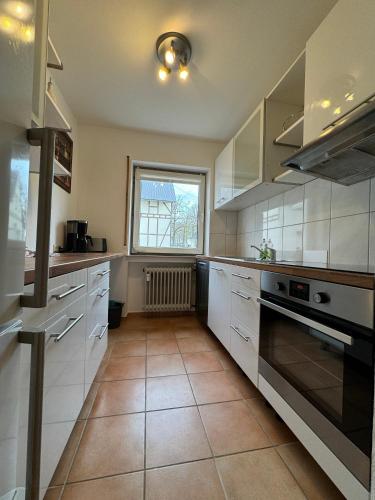 Кухня или мини-кухня в Ferienwohnung auf Pferdehof
