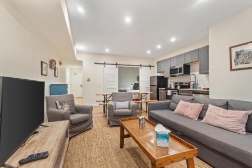 a living room with a couch and a table at 1-BR Getaway in the Heart of Adams Morgan in Washington, D.C.