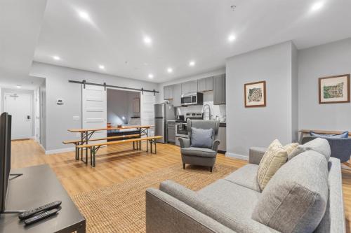 a living room with a couch and a table at Live Like a Local in the Heart of Adams Morgan in Washington, D.C.