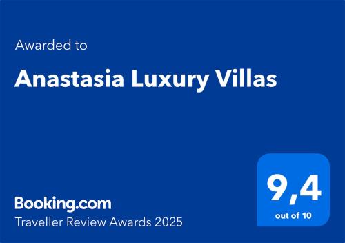 a blue sign with the words austasia luxury villas at Anastasia Luxury Villas in Gavrio