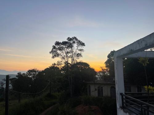 a view of the sunset from a house at Hanthana Heritage in Kandy