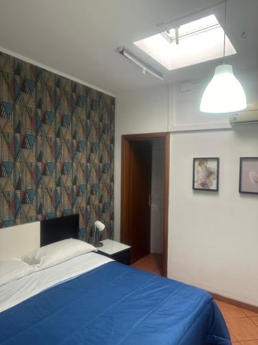 Кровать или кровати в номере Casa Felice a piazza Zama