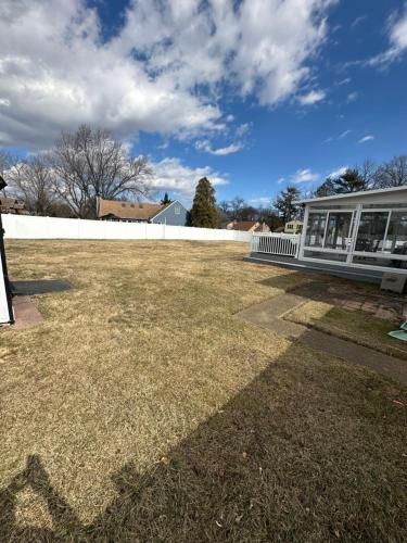 a large yard in front of a building at Home in North Wilmington in Wilmington