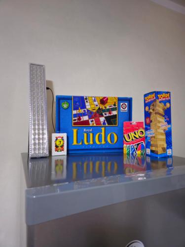 a shelf with toys and snacks on it at Residencia completa in Tinogasta