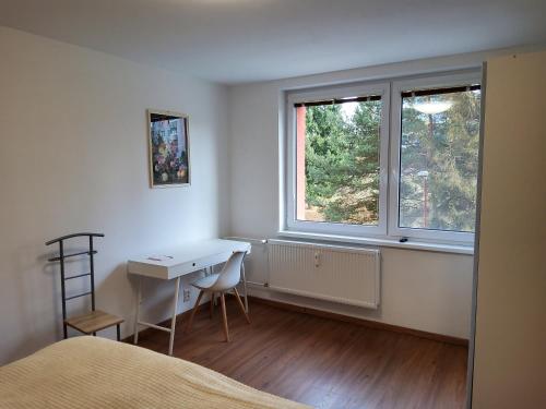 Ένα ή περισσότερα κρεβάτια σε δωμάτιο στο Apartmán Marek