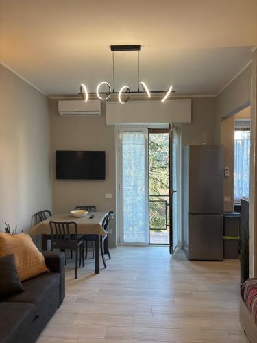 a living room with a couch and a table at Casa30 in Monza