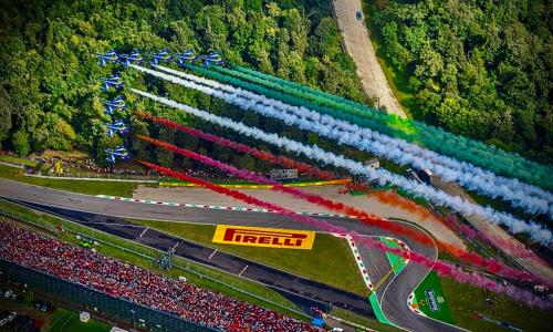 an overhead view of a race track with rainbow colors at Casa30 in Monza