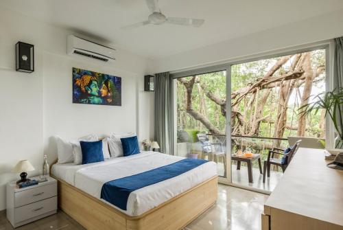 Ένα ή περισσότερα κρεβάτια σε δωμάτιο στο 3BHK Luxury Villa in North Goa Verem