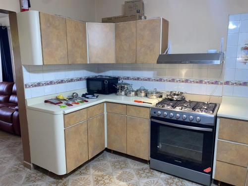 Una cocina o cocineta en Super beach suite