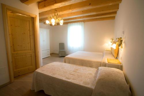 Katil atau katil-katil dalam bilik di Agriturismo Ae Cavane