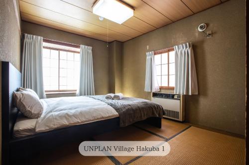 UNPLAN Village Hakubaにあるベッド