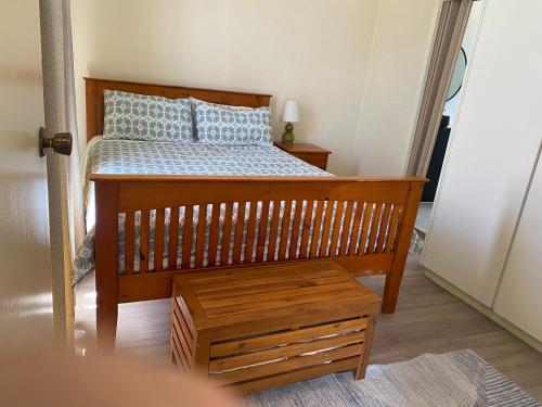 Postel nebo postele na pokoji v ubytování Kingscote Rest
