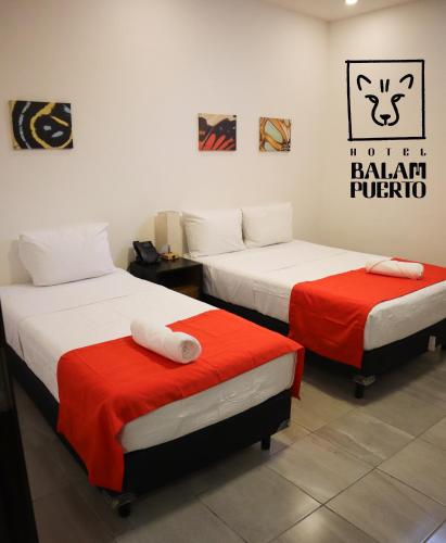 Katil atau katil-katil dalam bilik di Hotel Balam Puerto