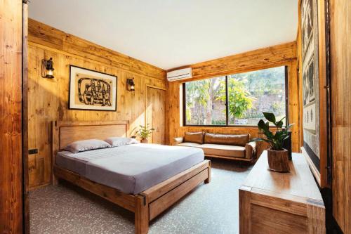 Ένα ή περισσότερα κρεβάτια σε δωμάτιο στο Lavita villa resort 2