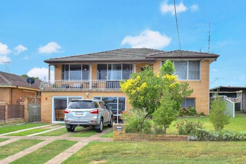 a car parked in front of a house at Coal d' Vine VIEW - Cessnock NSW in Cessnock
