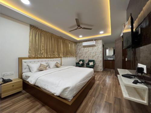 Ένα ή περισσότερα κρεβάτια σε δωμάτιο στο The Anantaar Hotels