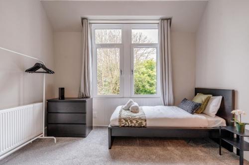 Ένα ή περισσότερα κρεβάτια σε δωμάτιο στο Classy private spacious flat