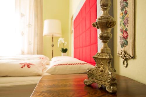 
A bed or beds in a room at Il Battente 1862 Exclusive Bed&Breakfast
