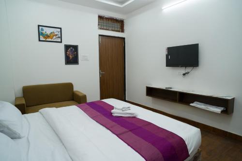 TV a/nebo společenská místnost v ubytování Hotel Shree Narayan