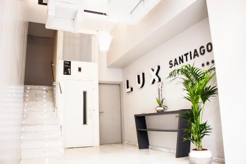 El vestíbulo o zona de recepción de Hotel Lux Santiago