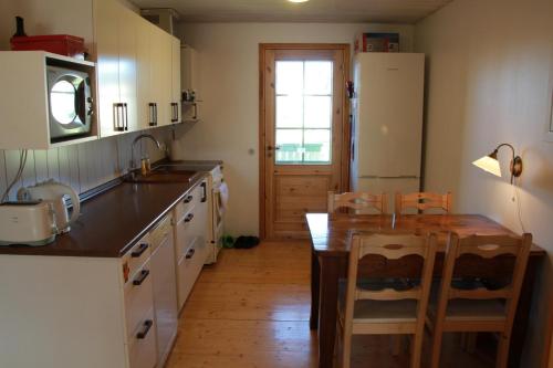 Kuchyň nebo kuchyňský kout v ubytování Tiiker B&B