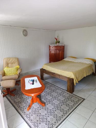 En eller flere senge i et værelse på Kaz à Marga