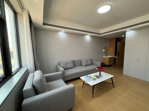 Χώρος καθιστικού στο 梦之南雅朵酒店 Mengzhinan Yaduo Hotel