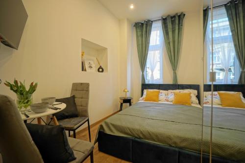 Postel nebo postele na pokoji v ubytování K'59 Prestige Apartments