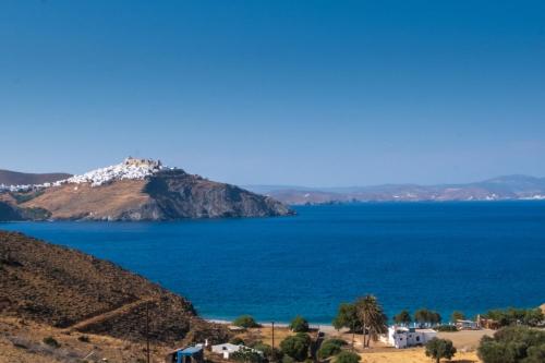a view of a large body of water at Giasemi Rooms in Livadi Astypalaias