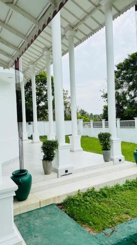 Κήπος έξω από το The Heavens Bungalow Katunayake