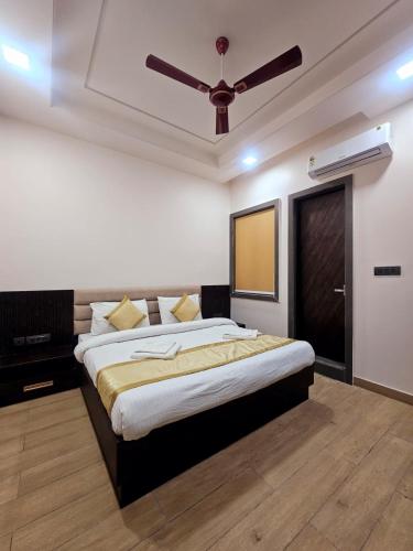 Ένα ή περισσότερα κρεβάτια σε δωμάτιο στο Shyam Palace Inn
