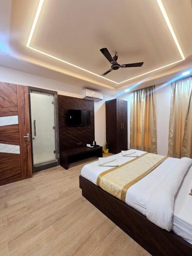 Ένα ή περισσότερα κρεβάτια σε δωμάτιο στο Shyam Palace Inn
