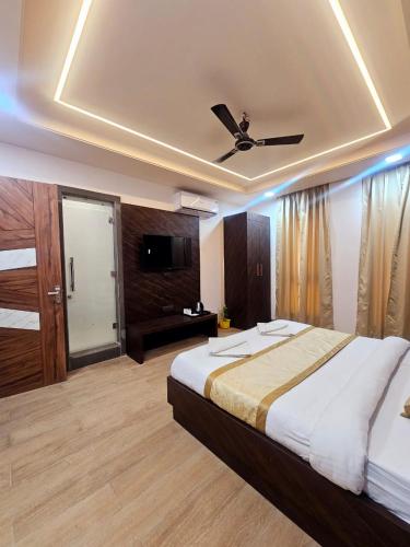 Ένα ή περισσότερα κρεβάτια σε δωμάτιο στο Shyam Palace Inn