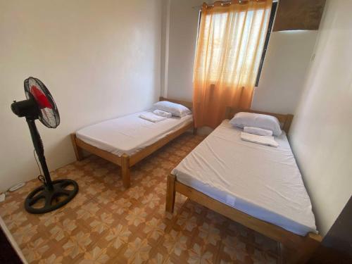 Кровать или кровати в номере Sebe Apartment