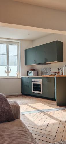 Dapur atau dapur kecil di Maison 3 chambres - Jardin de l'Évêché