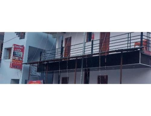 a building with scaffolding on the side of it at Gaurs home stay badrinath Highway, Pandukeshwar in Pāndukeshwar