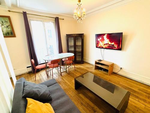 Posezení v ubytování Appartement Tour Eiffel Chapu