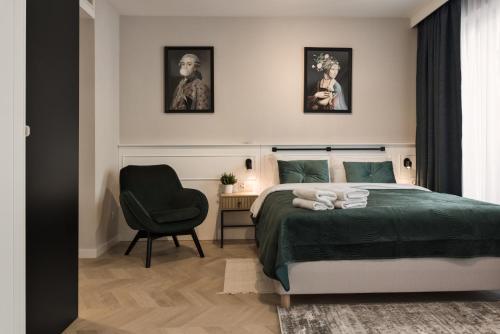 Ένα ή περισσότερα κρεβάτια σε δωμάτιο στο Metropolis Apartments
