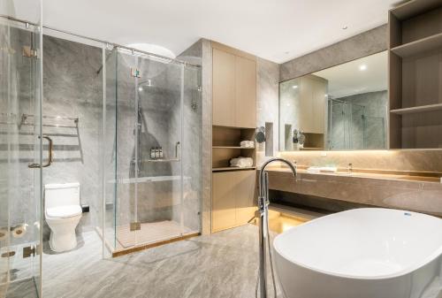 Ένα μπάνιο στο Holiday Inn Express Qidong Economic Zone by IHG