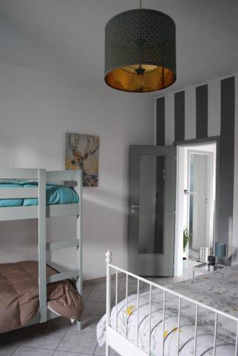 Postel nebo postele na pokoji v ubytování Le stanze di Alicam