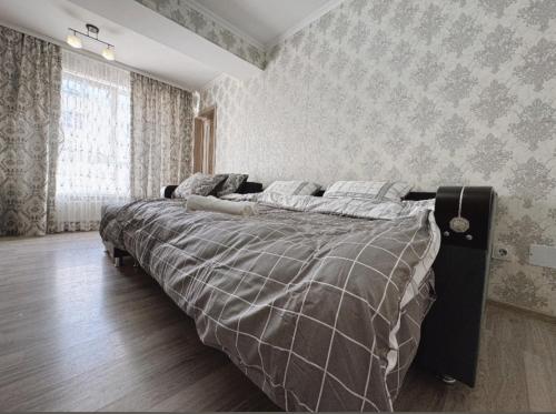 Ένα ή περισσότερα κρεβάτια σε δωμάτιο στο Luxury Sweet Apartment