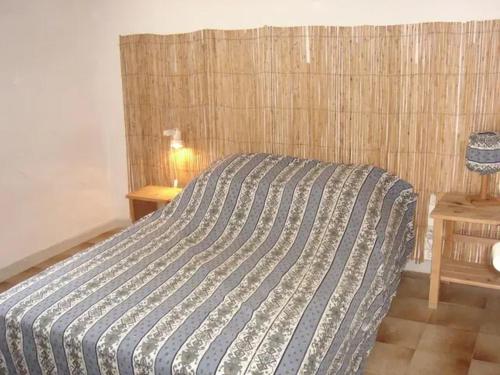 Una cama o camas en una habitación de Maison charmante, Monticello, vue mer