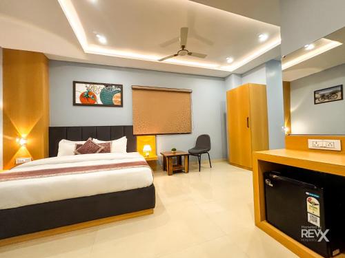 Hotel Manas Innにあるベッド