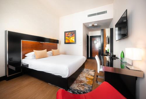 Postel nebo postele na pokoji v ubytování Grand Majestic Hotel Prague