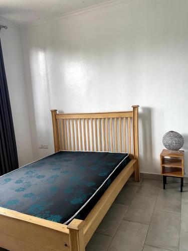 Llit o llits en una habitació de Mala Apartment