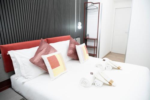 Ένα ή περισσότερα κρεβάτια σε δωμάτιο στο Teulada Luxury Rooms