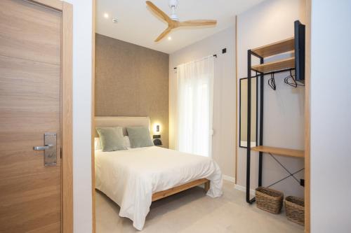 Posteľ alebo postele v izbe v ubytovaní Chinitas Urban Rooms