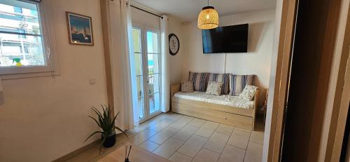 Postel nebo postele na pokoji v ubytování Appartement VOILES BLANCHES-Clim-Wifi-Plage a pieds